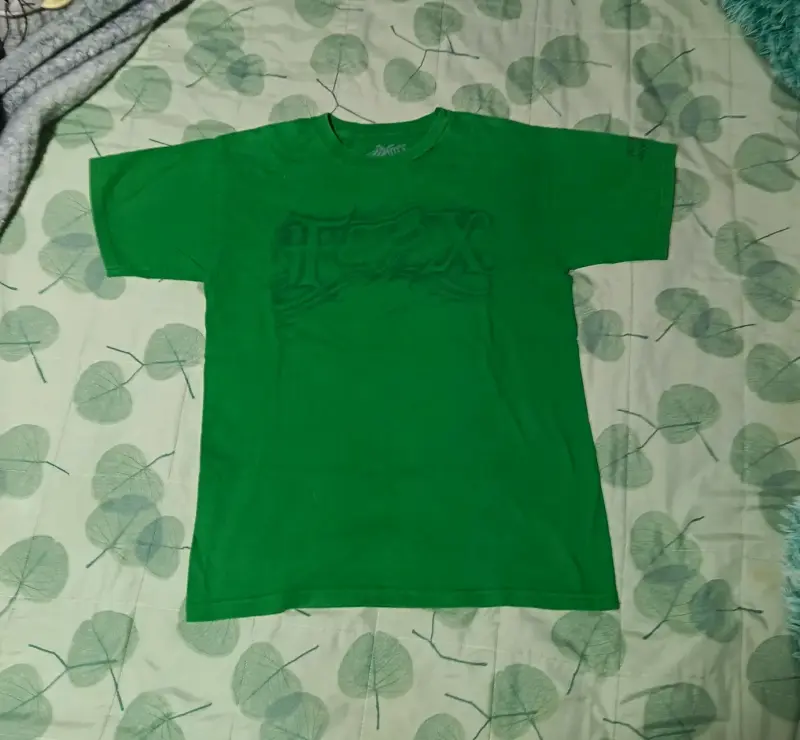 Polera verde estampada - 1