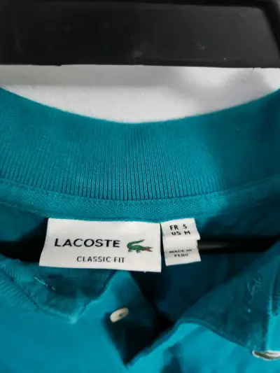 Polera Lacoste talla S tipo polo azul - miniatura 2