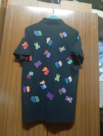 Polera negra Psycho Bunny con estampados PB - miniatura 3