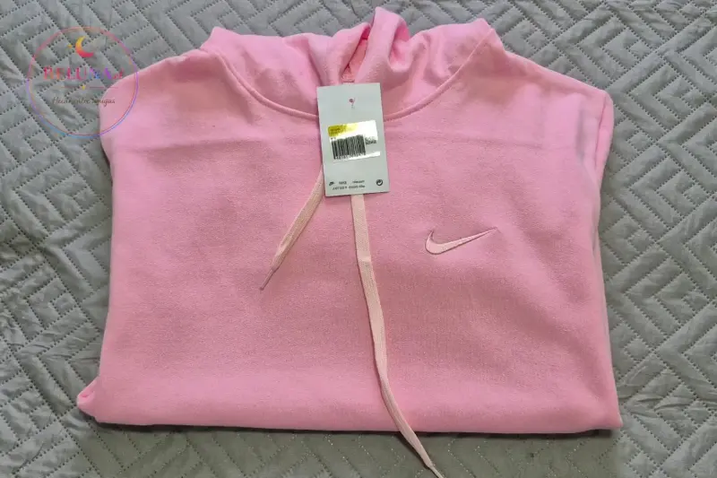 Polerón rosado con capucha Nike - 1