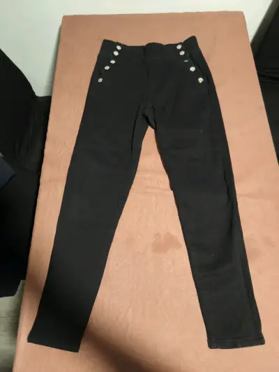 Pantalones negros con botones - miniatura 1