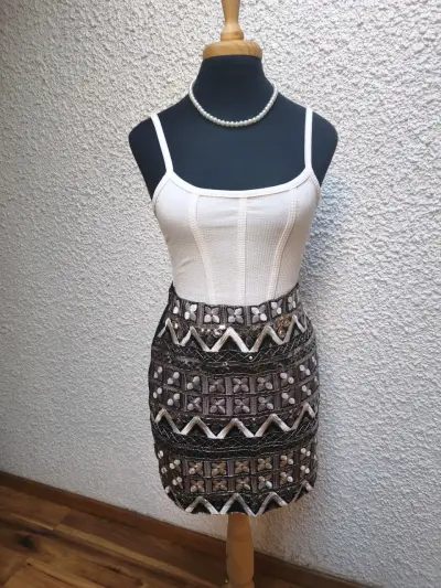 Outfit completo falda detalles más top - miniatura 1