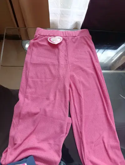 Pantalones rosados brillantes para niña - miniatura 1