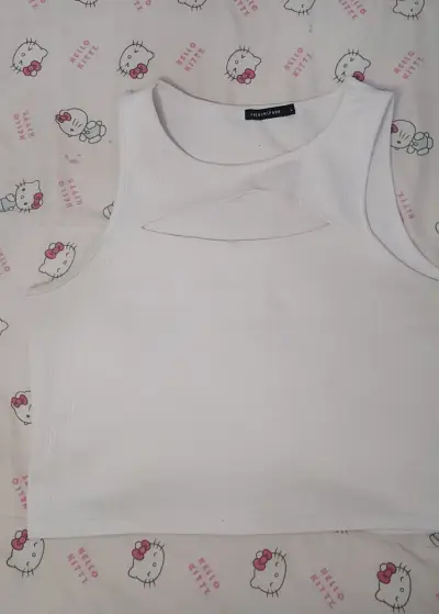 Polera sin mangas blanca - miniatura 1