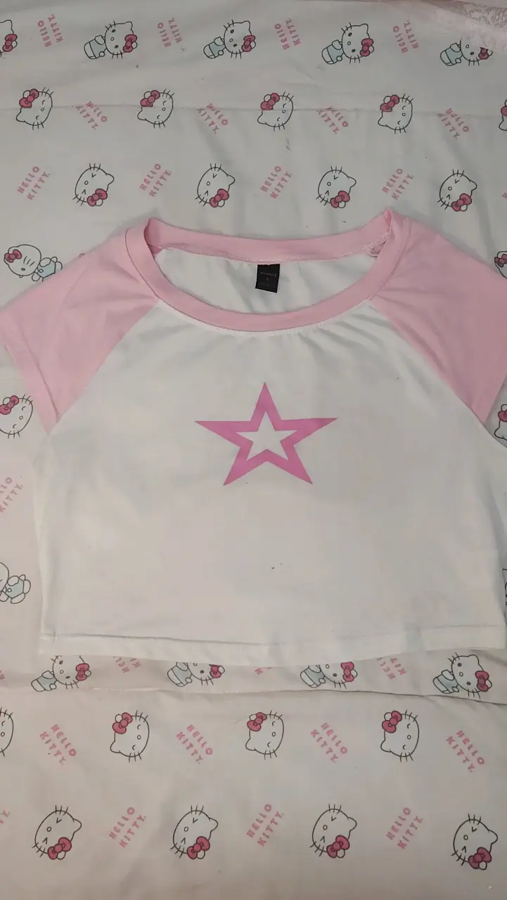 Polera blanca con estrella rosa - 1