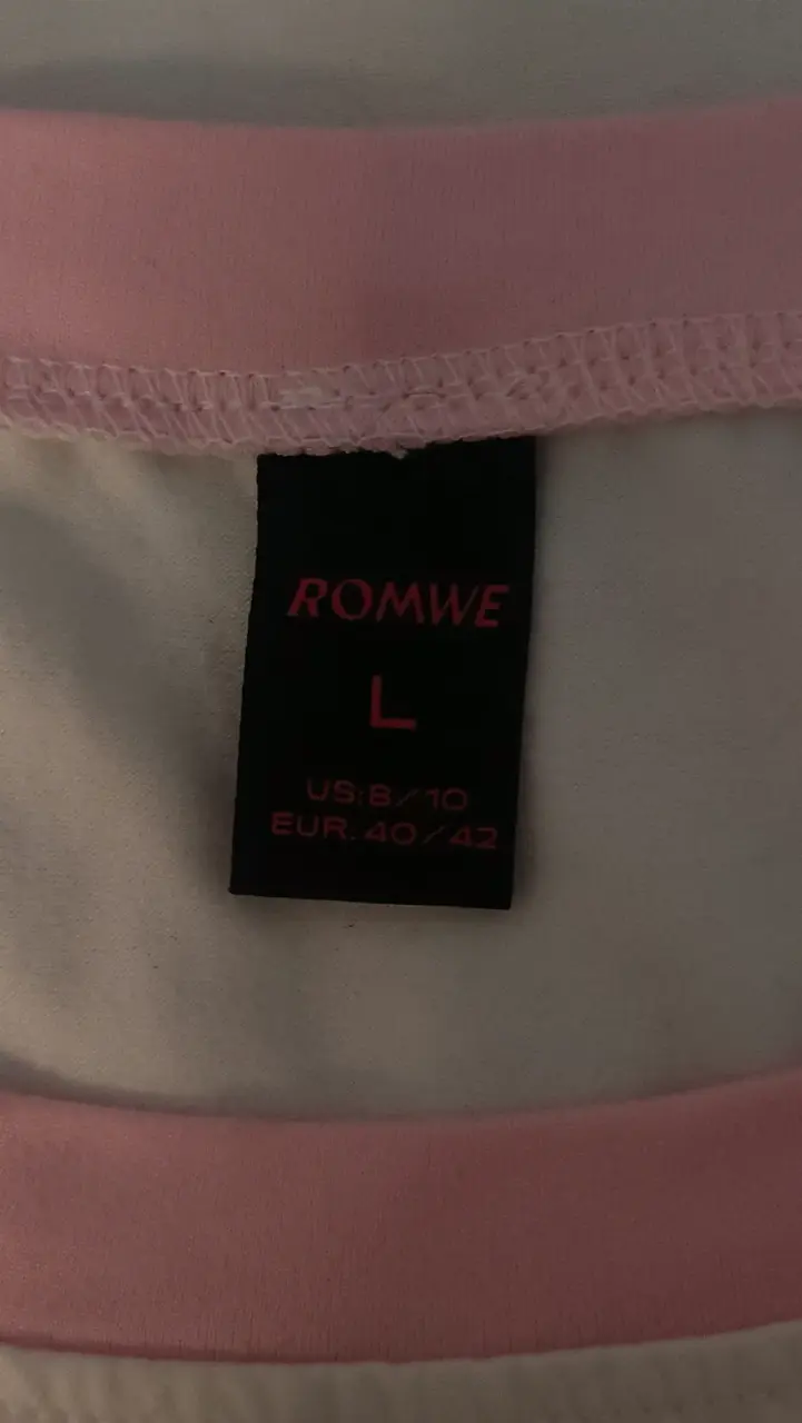 Polera blanca con estrella rosa - 2