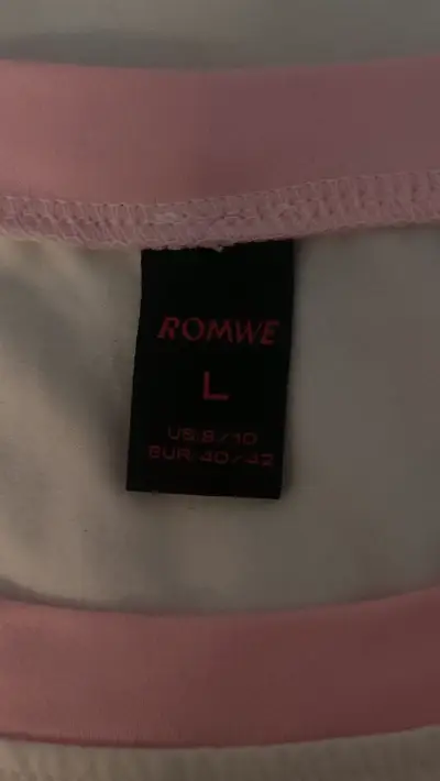 Polera blanca con estrella rosa - miniatura 2