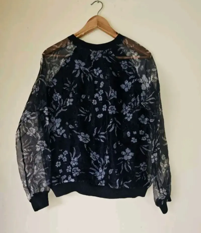 Polero azul floral con mangas transparente - 1