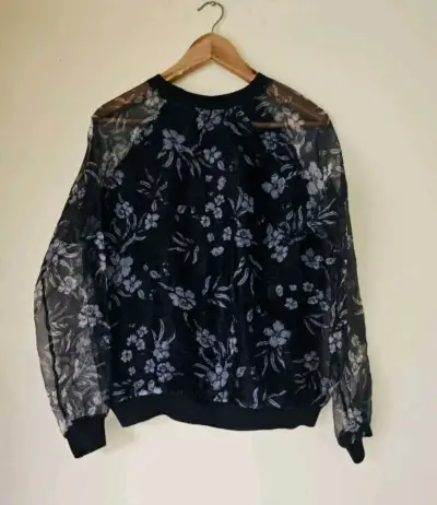 Polero  azul  floral con mangas transparente - miniatura 1