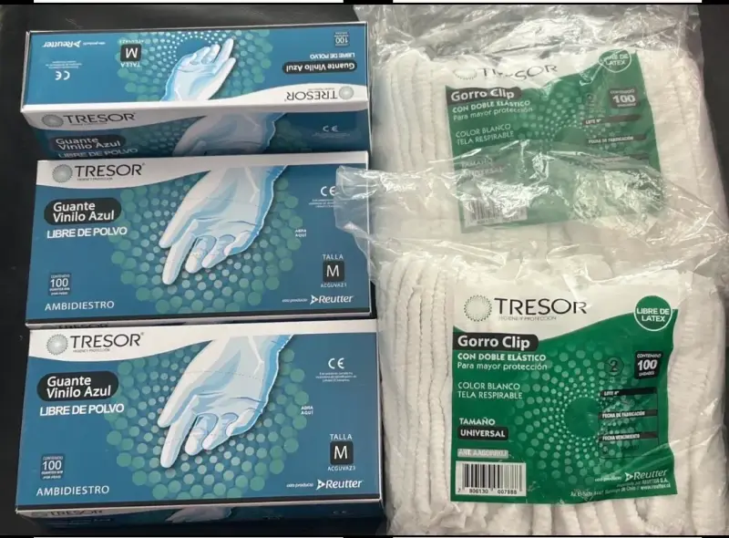 Guantes vinilo azul y gorros clip Tresor