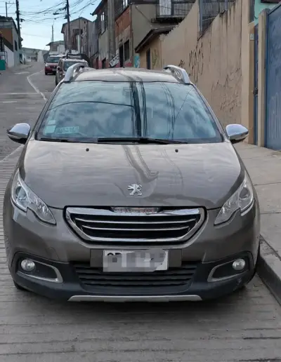 Auto Peugeot gris en buen estado - miniatura 1