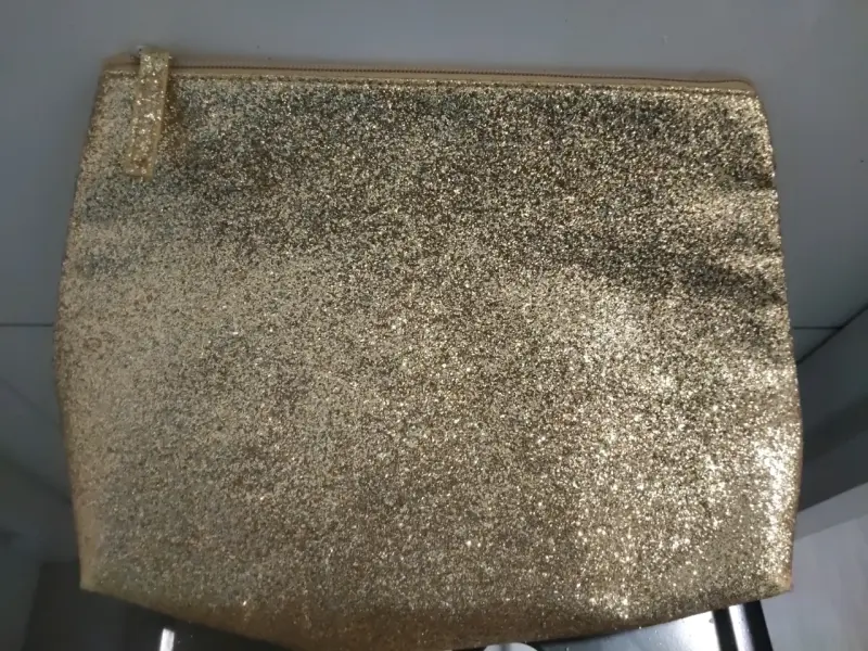 Bolso clutch dorado con brillo - 1