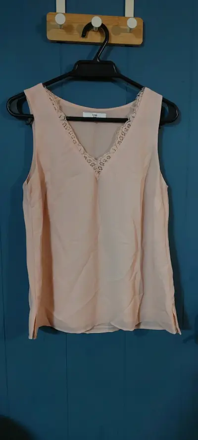 Blusa sin mangas color durazno - miniatura 1