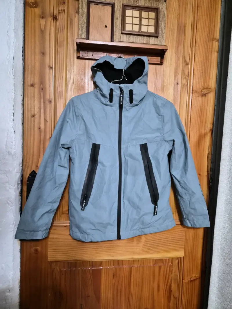Chaqueta impermeable azul hombre