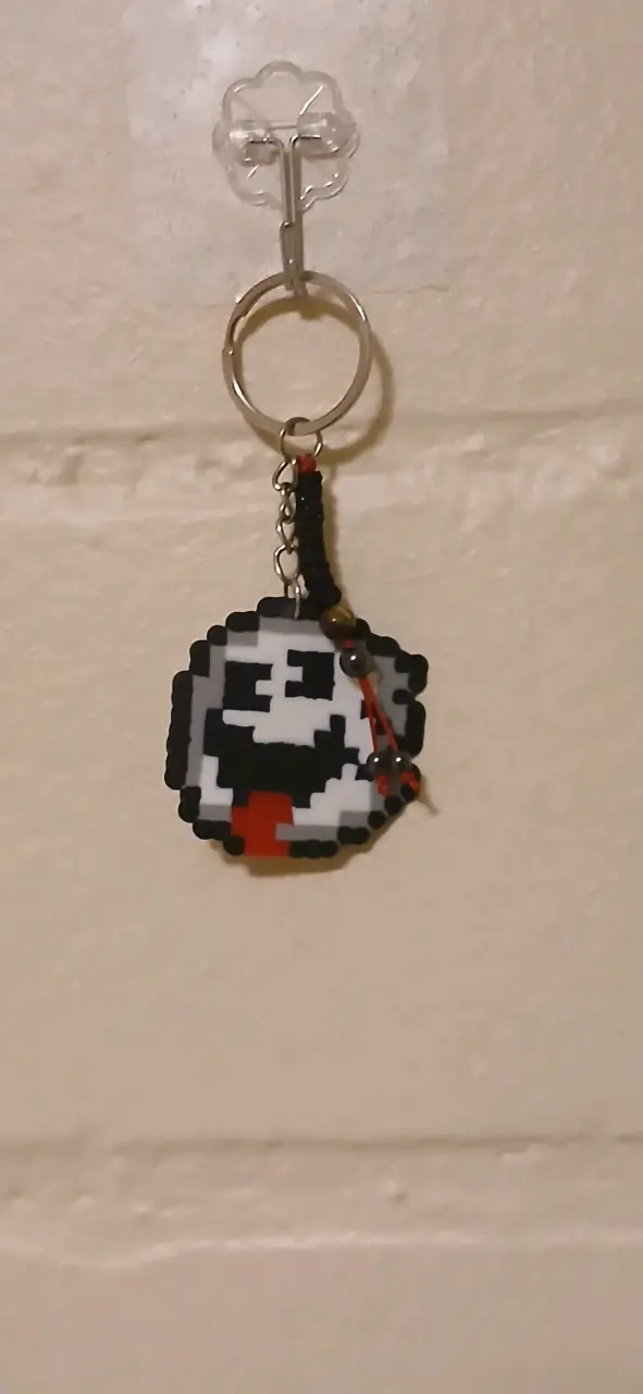 Llavero retro de mario, con ojo de tigre y hematit - 2