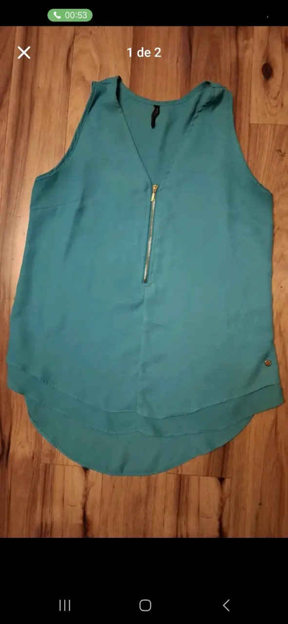 Blusa verde sin mangas - 1