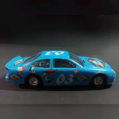 Auto de juguete azul con dibujos - miniatura 3