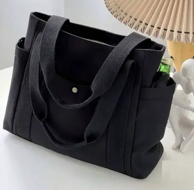 Bolso tote negro con bolsillos - miniatura 1
