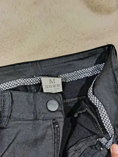 Pantalones negros clásicos - miniatura 2