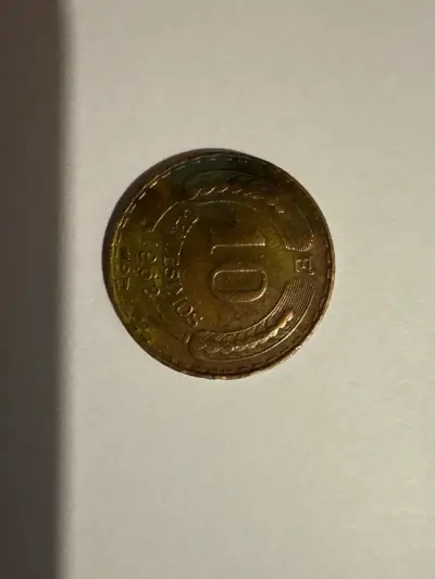 Moneda con águila dorada - miniatura 2