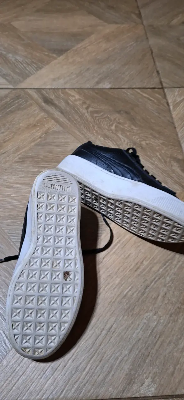 Zapatillas negras Puma casuales - 1