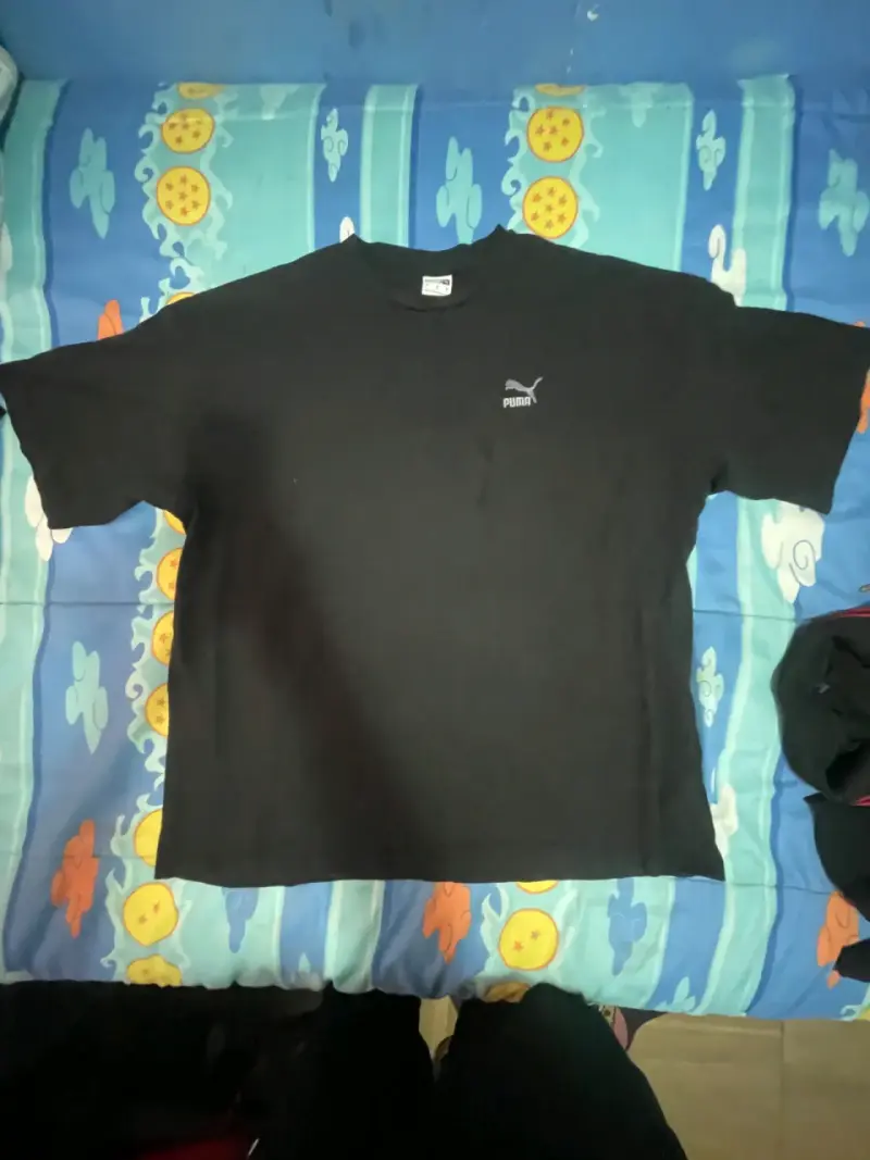 Polera negra Puma estampada - 1