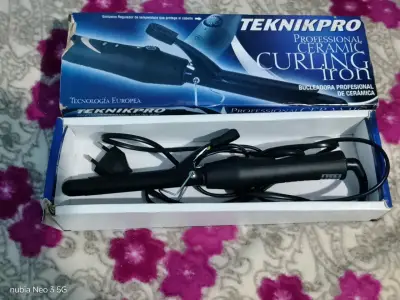 Plancha de pelo Philips negra y onduladora - miniatura 2