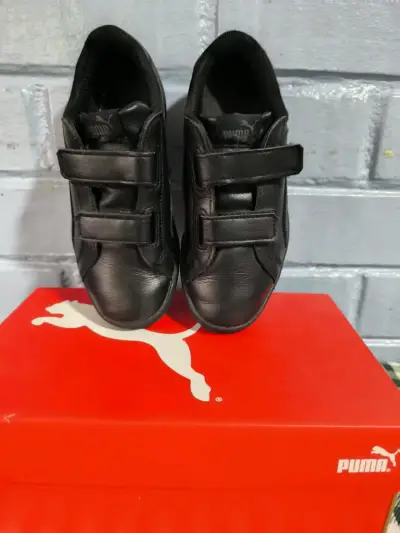 Zapatillas negras Puma con velcro - miniatura 1