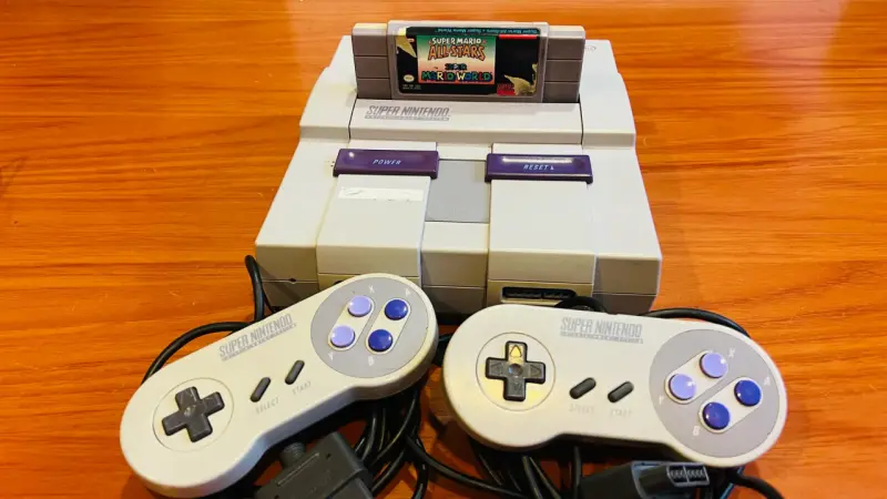 Super Nintendo SNES con 2 controles y 9 juegos - 1