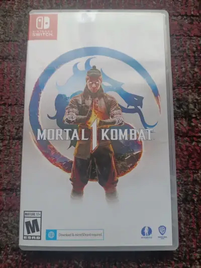 Mortal Kombat 1 para Nintendo Switch + DLC SIN USO - miniatura 1