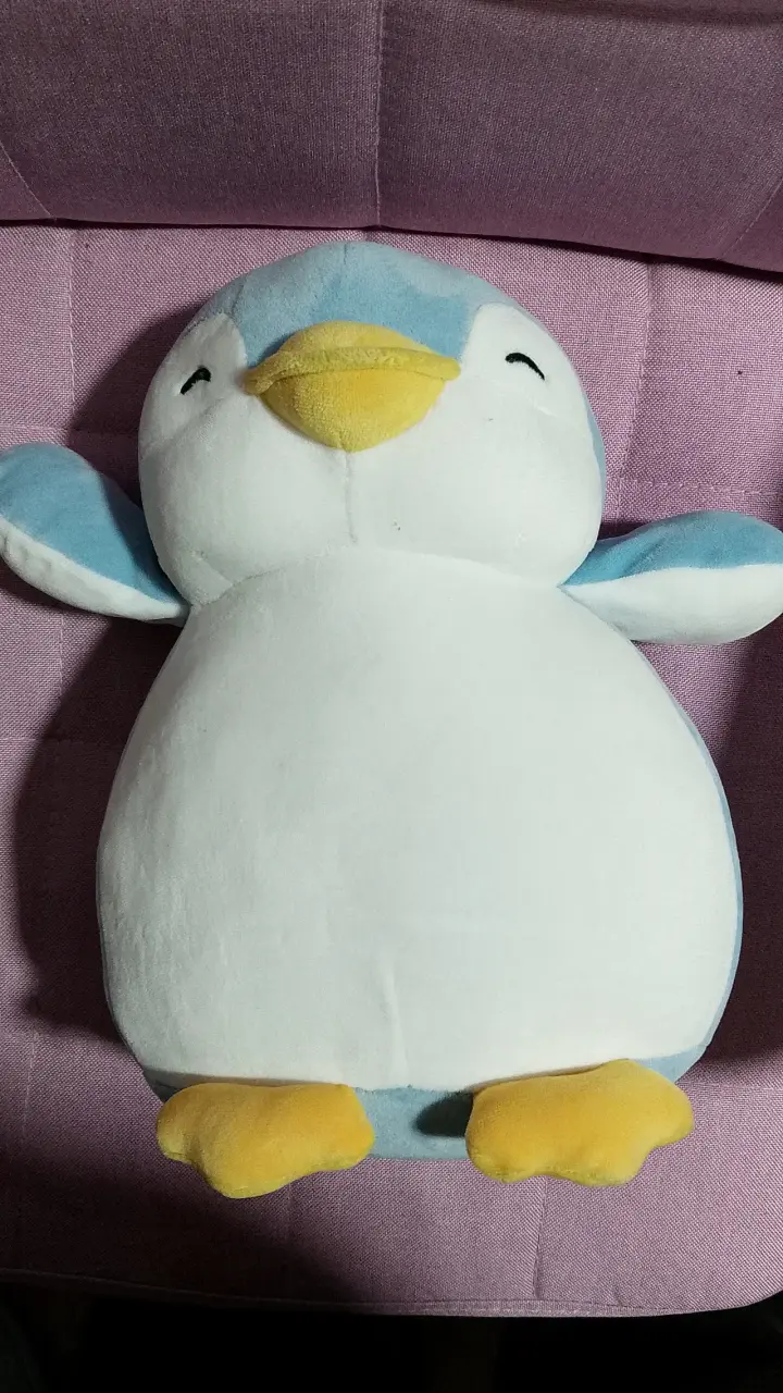 Peluche pingüino azul y blanco