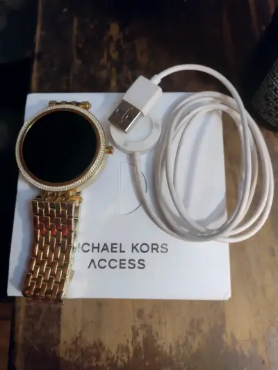 Reloj inteligente dorado Michael Kors - miniatura 1