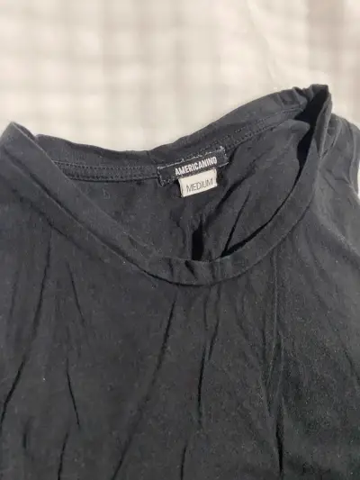 Polera negra sin mangas - miniatura 2