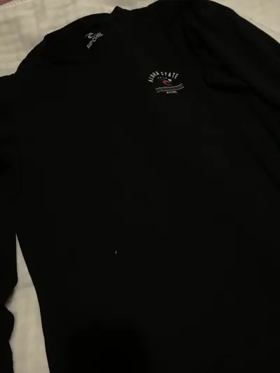 Polera Rip Curl negra - miniatura 1