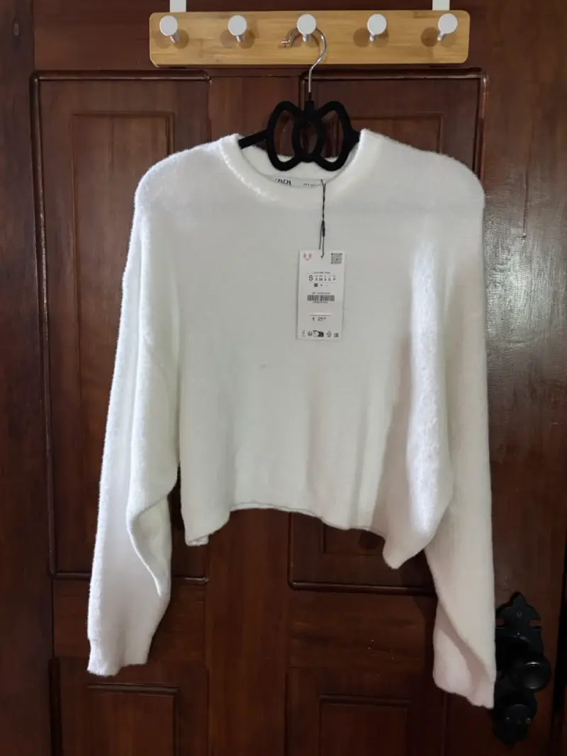 Suéter blanco de lana nuevo