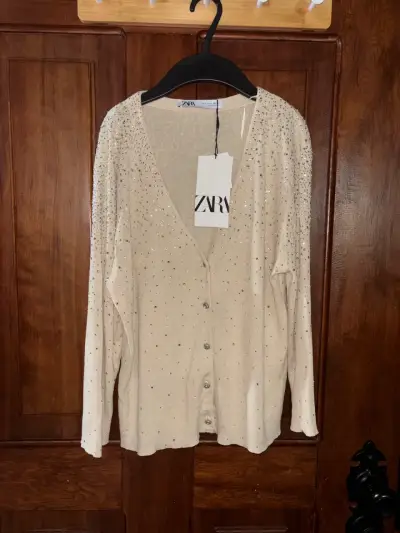 Cardigan beige con brillantes Zara - miniatura 1