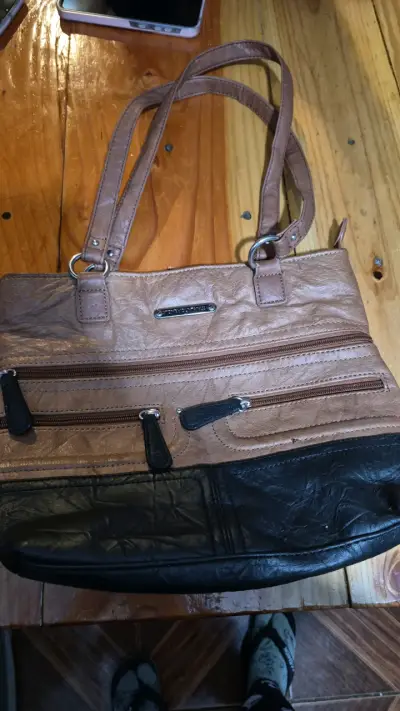 Cartera cruzada café y negra - miniatura 1