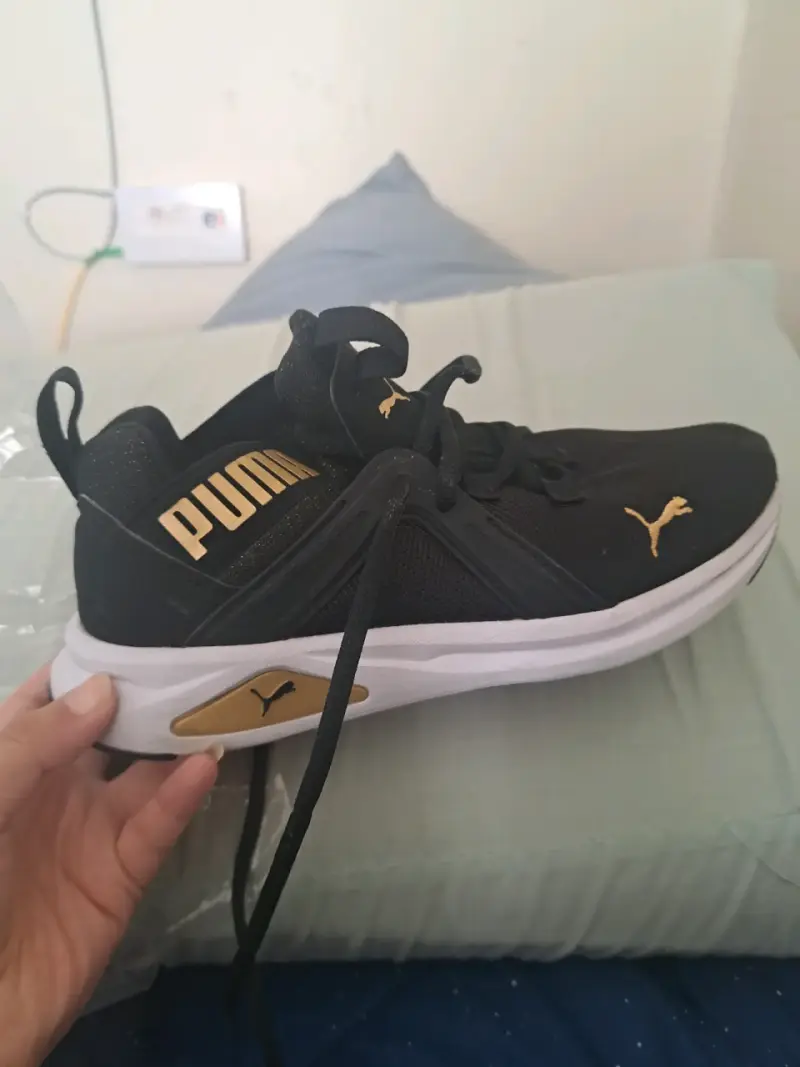 Zapatillas negras Puma deportivos - 1