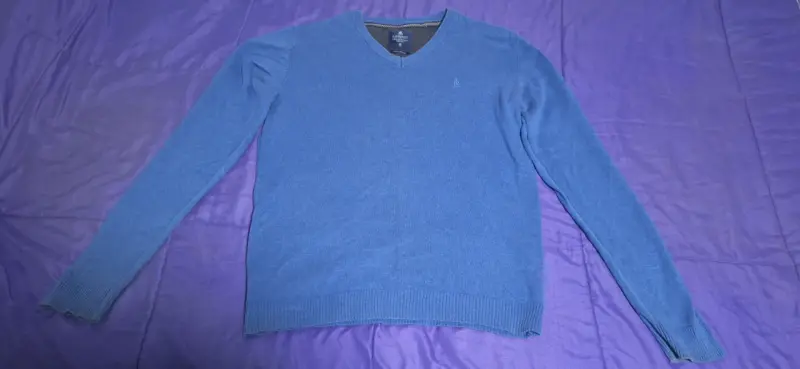 Suéter azul cuello en V - 1