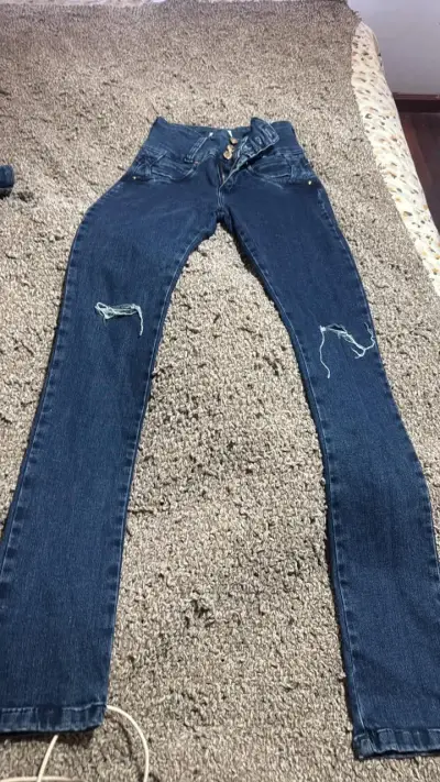 Jeans celestes con zippers - miniatura 5