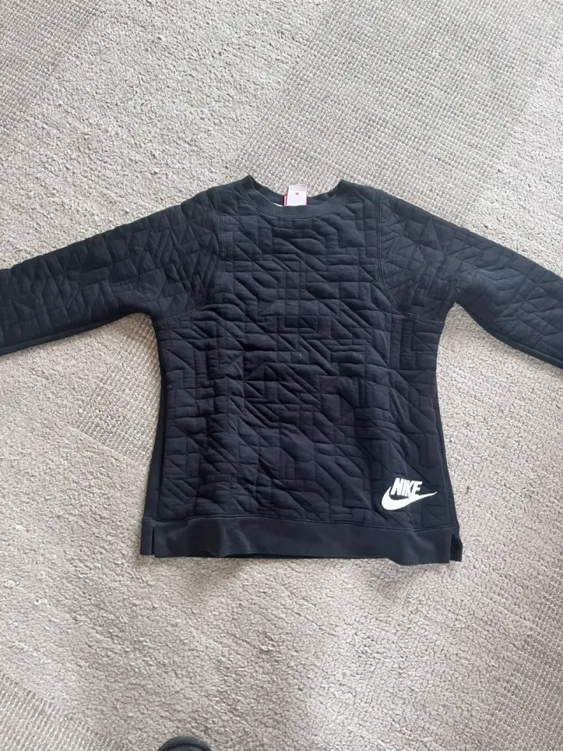 Polerón negro Nike acolchado