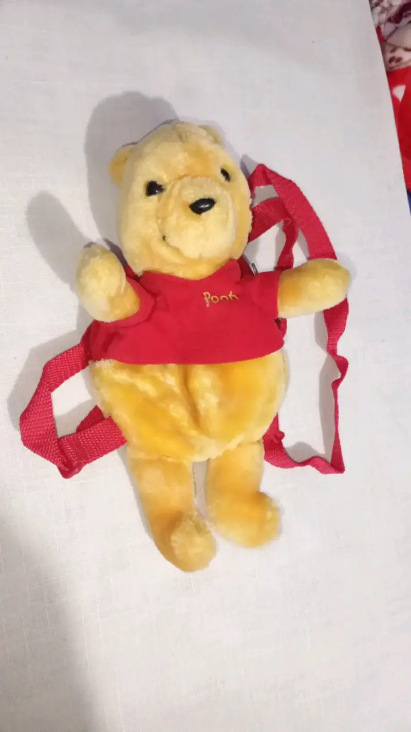 Mochila peluche amarillo Pooh