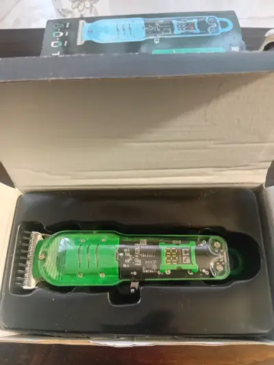 Cortadora de cabello verde - miniatura 1
