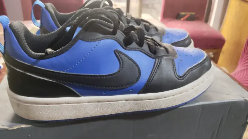 Zapatillas Nike deportivas azul y negro - 1