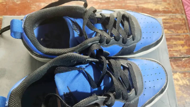 Zapatillas Nike deportivas azul y negro - 2