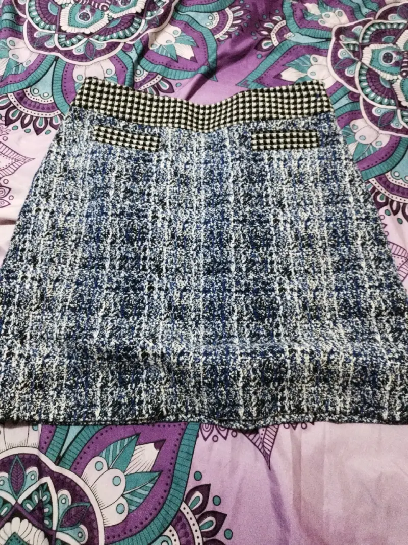 Falda corta de tweed azul