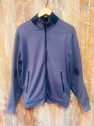 Chaqueta deportiva morada Nike - miniatura 1