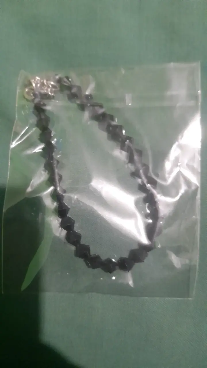 Pulcera negro en bolsa