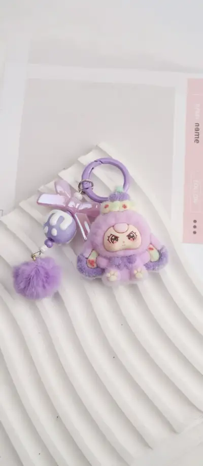 Llavero peluche morado - miniatura 1