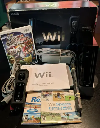 Nintendo Wii RVL 001 con accesorios y 3 juegos - miniatura 1